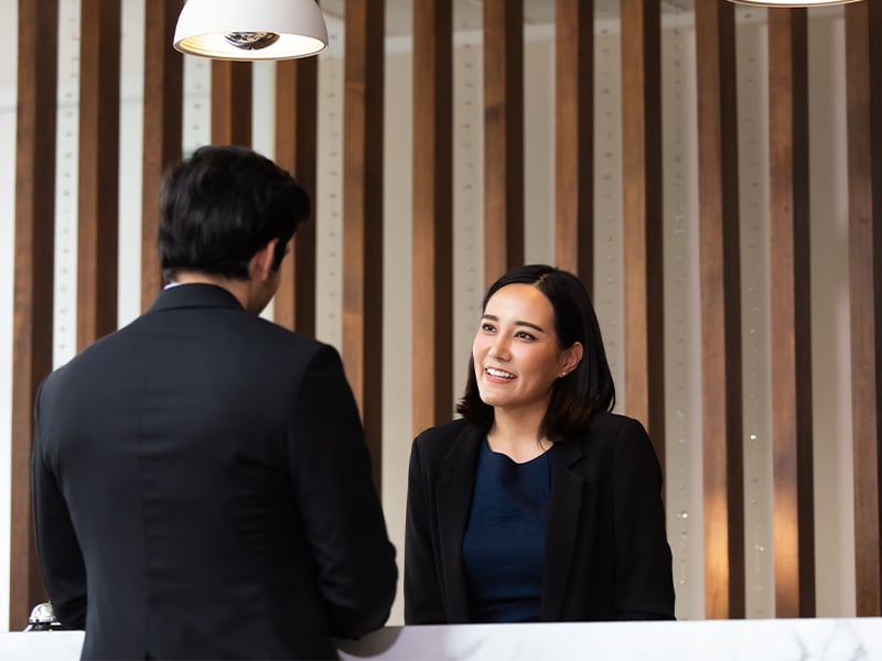 receptionist-greets-guest-4-3